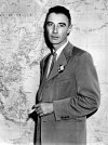 1950 год. Дж. Роберт Оппенгеймер перед картой Восточной Азии..jpg